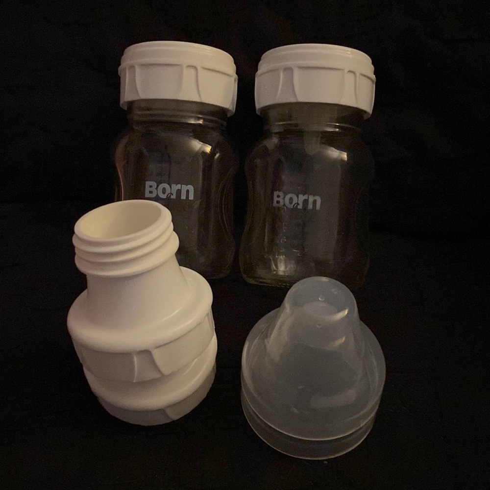 Born Free glass baby bottles with pump adapters and storage tops